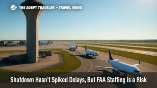 A busy U.S. airport tower overlooks a taxiway queue as jets line up, underscoring government shutdown flight delays risk.