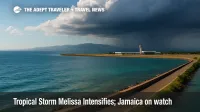 Low storm bands over Kingston Harbour with Norman Manley International in view, illustrating Tropical Storm Melissa travel impacts.