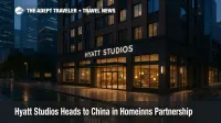 Hyatt Studios signage over a glass-fronted hotel in a Chinese business district at dusk, illustrating the Hyatt Studios China expansion.