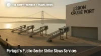 Lisbon Cruise Port with idle gangways and closed quay during Portugal strike, Tagus River and bridge in background.