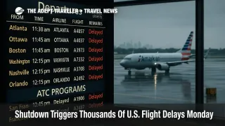 Departures board showing delays at Newark Liberty during the shutdown with a taxiing aircraft on a wet ramp and skyline haze in the background