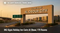 Al Obour City entrance sign and Cairo-Ismailia Desert Road at golden hour, illustrating the future Holiday Inn Cairo Al Obour location corridor