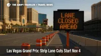 Elevated view of Las Vegas Boulevard near Sands and Harmon with lane-closure boards and barriers as Grand Prix preparations narrow Strip traffic