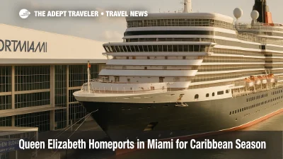 Cunard Queen Elizabeth alongside at PortMiami in late afternoon light, terminal signage visible during Miami homeport Caribbean season