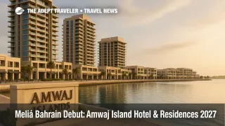 Amwaj Islands waterfront promenade with marina, towers, and entrance sign, illustrating Meliá's 2027 Bahrain debut on the upscale island setting
