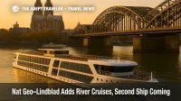 Modern river cruise ship docked on the Rhine near Cologne Cathedral at sunset, signaling National Geographic-Lindblad's Europe river cruise launch