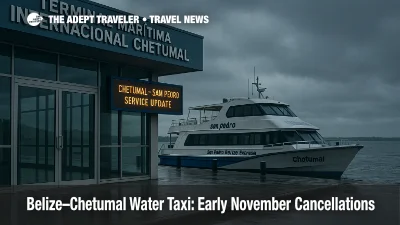 Overcast view of Chetumal Maritime Terminal entrance with moored Belize water taxi, signage indicating a service update on the Chetumal-San Pedro route