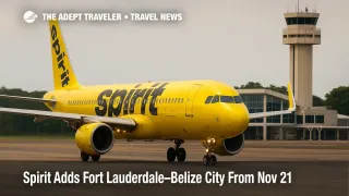 Spirit Airlines Airbus A320 taxiing at Philip S. W. Goldson International before Fort Lauderdale-Belize City service launch, terminal and tower visible