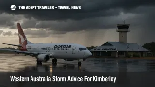 Aircraft taxiing at Broome International Airport with storm clouds and wet tarmac, illustrating Kimberley storm advice and transfer delays