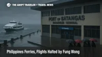 Rain lashes Port of Batangas as Fung Wong suspends ferries, wet quay and choppy water outside the passenger terminal in Batangas City