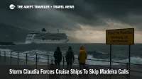 Storm Claudia disrupts Madeira cruise calls as a ship passes Funchal harbor under dark Atlantic clouds and whitecapped seas
