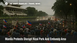 Large peaceful crowd gathers for Manila protests at Rizal Park near the U S Embassy, with police lines and closed roads causing heavy traffic