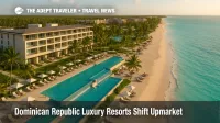 Aerial view of Dominican Republic luxury resorts along Punta Cana's beach and turquoise water under a bright tropical sky