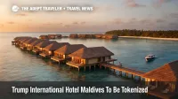 Overwater villas near Malé Atoll at sunset, evoking the future Trump International Hotel Maldives tokenized luxury resort.