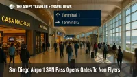 Travelers walk through San Diego International Airport Terminal 1 concourse after security, passing shops and gates highlighted in a story about the SAN Pass program.