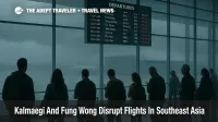 Typhoon Kalmaegi Vietnam flights delayed as travelers watch the departures board at Da Nang Airport during stormy weather