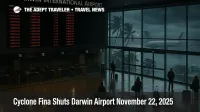 Travelers wait in Darwin airport departures hall as Cyclone Fina Darwin airport closure leaves flights grounded in rain.