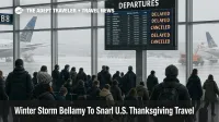 Passengers watch the board at Chicago O Hare as Winter Storm Bellamy travel delays disrupt holiday flights.