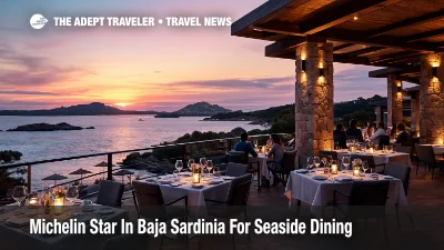 Guests dine at a Baja Sardinia Michelin star restaurant terrace at 7Pines Resort Sardinia, overlooking the sea at sunset.