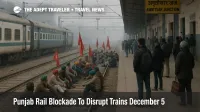 Farmers block tracks during Punjab rail blockade December 5 at Amritsar Junction as halted trains and waiting passengers show disrupted North India travel