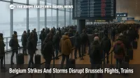 Travelers queue under a departures board at Brussels Airport as Belgium strikes Brussels flights during winter storms, with several services shown cancelled