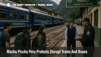 Travelers wait at Aguas Calientes station as Machu Picchu rail blockades disrupt trains and buses during ongoing protests over the shuttle bus concession