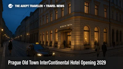 Evening street scene in Prague Old Town shows the future InterContinental Prague hotel in a restored historic building welcoming luxury guests in 2029