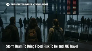 Travelers watch a departures board at Dublin Airport as Storm Bram Ireland UK travel disruption causes delays during heavy rain and strong winds