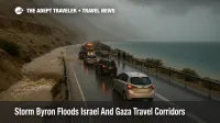 Cars inch along a flooded Route 90 near the Dead Sea as Storm Byron Israel travel corridors face closures, delays, and flash flood risks