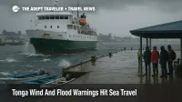 Ferry and small boats at Nuku'alofa wharf as Tonga wind warnings and rough seas disrupt sea travel between Tongatapu and outer islands.