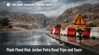 Jordan flash flood risk Petra, storm clouds over the Siq entrance and a wet road signal likely tour and transfer delays