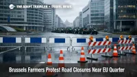 Brussels farmers protest road closures near the EU Quarter, with barricades and empty lanes by Schuman roundabout