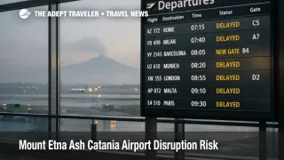 Mount Etna ash Catania airport risk shown by a hazy runway and a departures board with delays