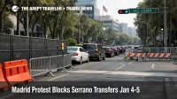 Madrid protest Serrano transfers snarl traffic near the U.S. Embassy, with taxis rerouting around police barriers
