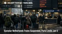 Eurostar Netherlands trains suspended as passengers wait under the departures boards at Paris Gare du Nord