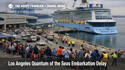Quantum of the Seas delay in Los Angeles, ship at berth as late afternoon crowds wait outside the cruise terminal