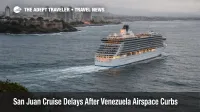 San Juan cruise delays shown by a ship underway off Puerto Rico under overcast skies, signaling disrupted embarkation timing.