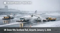 Scotland snow rail closures and airport delays shown by snow crews clearing a runway at Aberdeen International Airport
