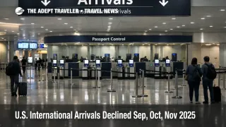 U.S. international arrivals decline shown by a quiet airport arrivals hall with short passport control queues.