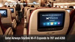 Qatar Airways Starlink Wi-Fi display glows in a 787 cabin during boarding at Hamad International Airport