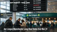 Aer Lingus Manchester transatlantic flights sale halt shown on a departures board, with travelers planning reroutes