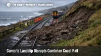 Cumbria landslip rail disruption on the Cumbrian Coast Line shows mud on tracks near Drigg and Seascale