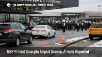 MSP airport protest access disruption shown at Terminal 1 curbside with traffic slowing and a small crowd in the distance