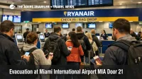 Miami airport evacuation Door 21 disruption shown as an empty MIA departures curbside with reopened checkpoint signage