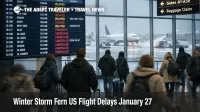 Winter Storm Fern US flight delays shown on BOS departures board as travelers wait during recovery operations