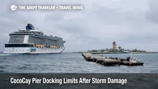  CocoCay pier docking limits as a cruise ship approaches under gray skies, signaling possible private island itinerary changes