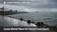 Cyclone Mitchell Pilbara port closures shown by an overcast Port Hedland harbor with empty berths and rough seas