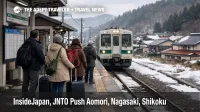 Travelers wait at a rural Aomori rail platform, reflecting Japan undertourism itineraries beyond the Golden Route