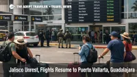 Puerto Vallarta airport flights resume as travelers queue at check in with departures boards showing normal operations