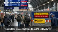 Frankfurt Hbf platform closures shown by fenced access to platforms 15 and 16 and travelers checking a departures board